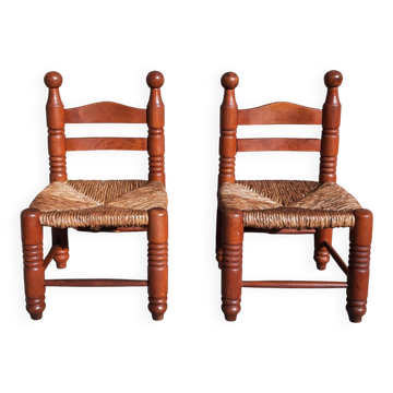 Paire de fauteuils bas de cheminée. (Assise paille)