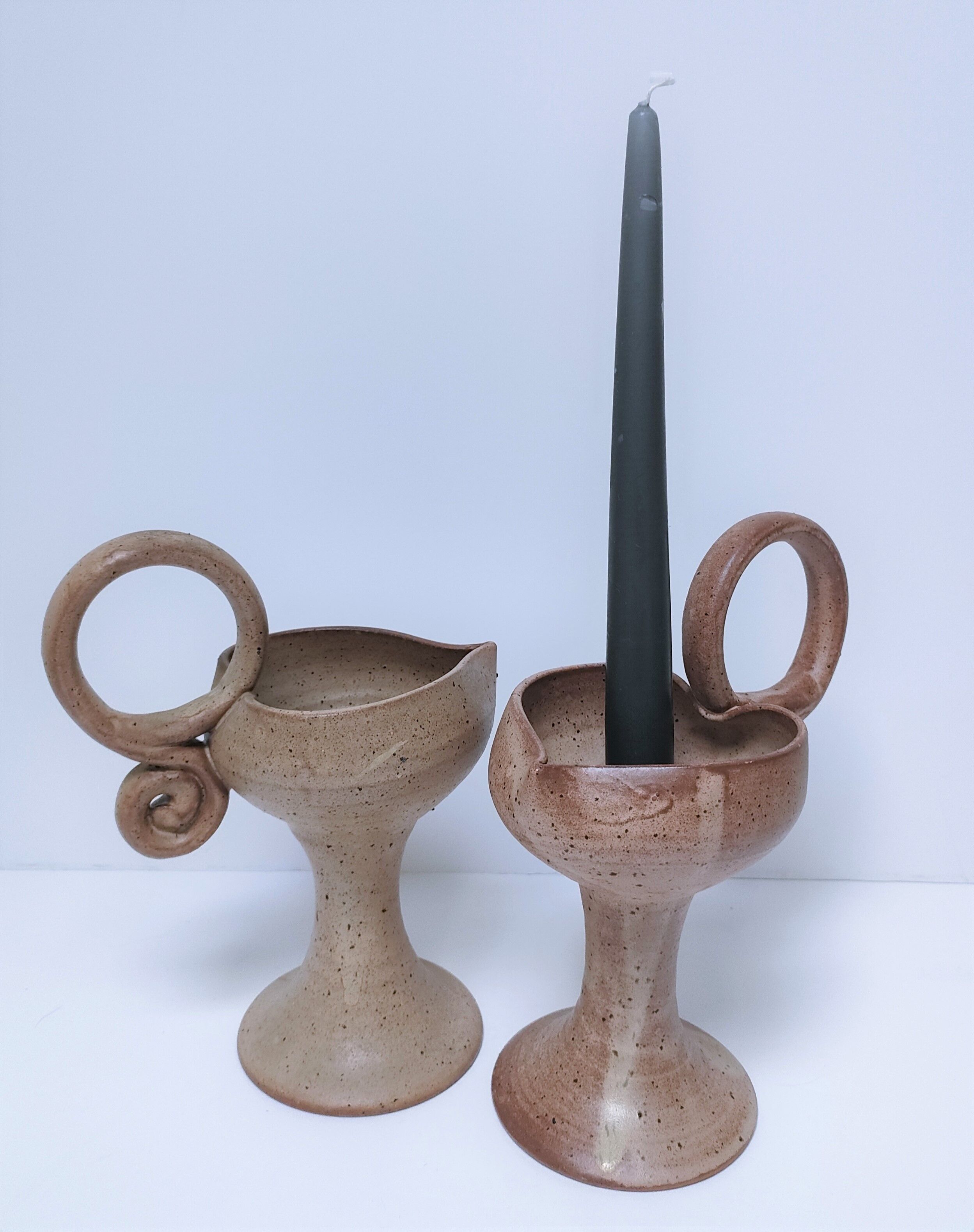 Pair of vintage “heart” sandstone candlesticks