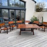 Rectangular dining table set and its suite of 6 armchairs in exotic wood and bamboo.