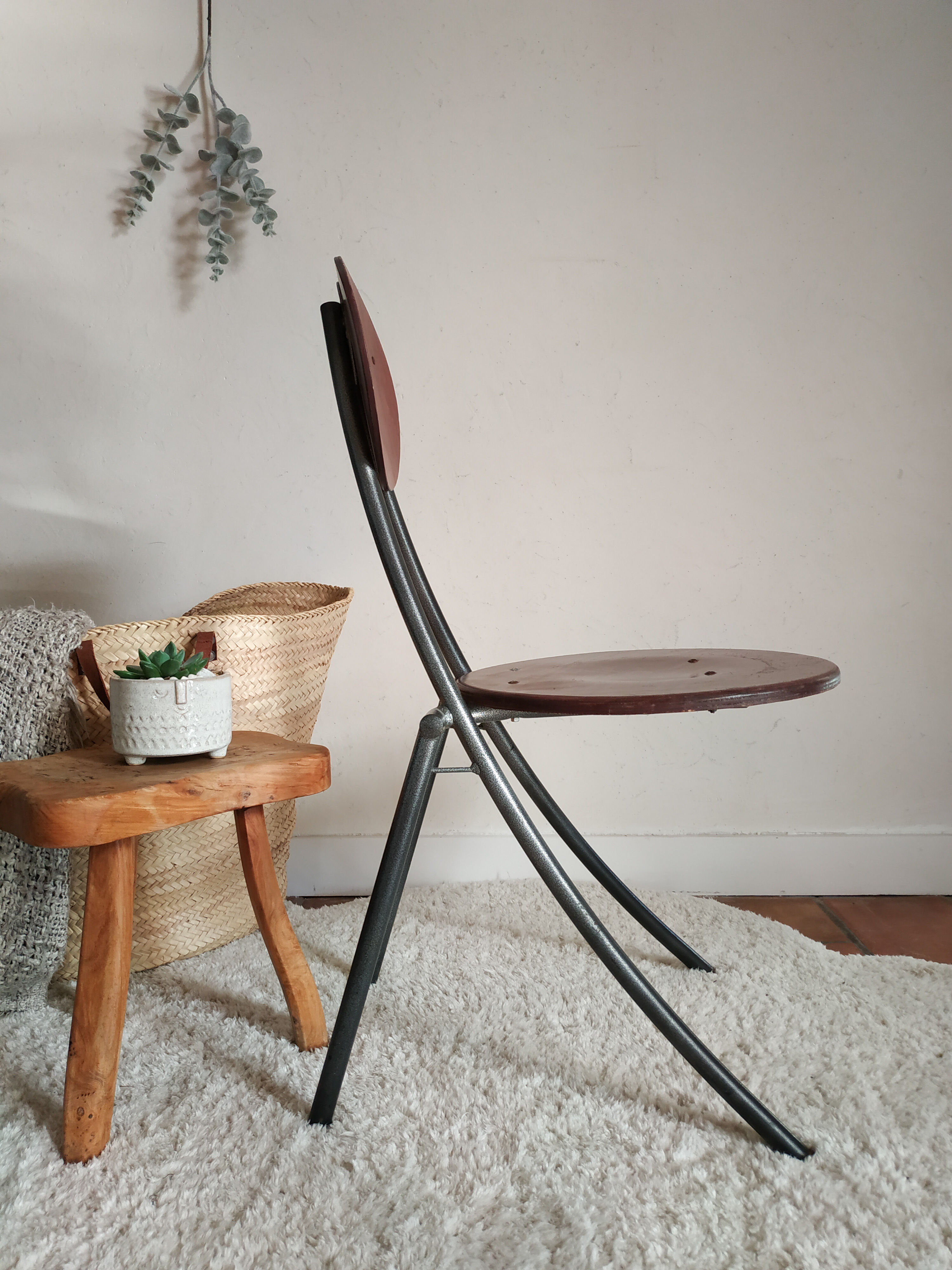 Old wooden chair and seated metal and round back