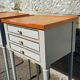 Pair of patinated bedside tables in Louis XVI style