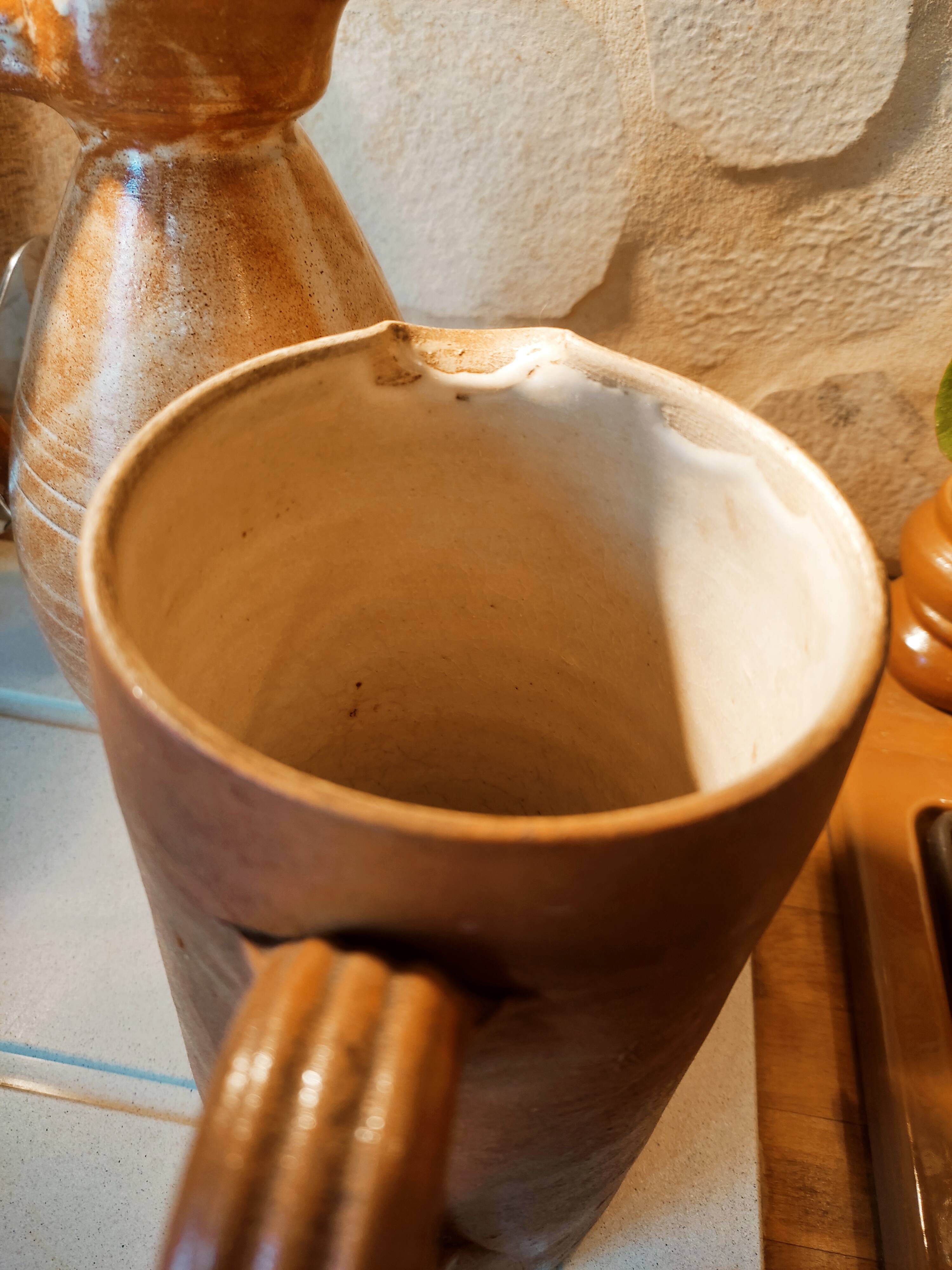 Duo of pitchers water, wine