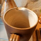 Duo of pitchers water, wine