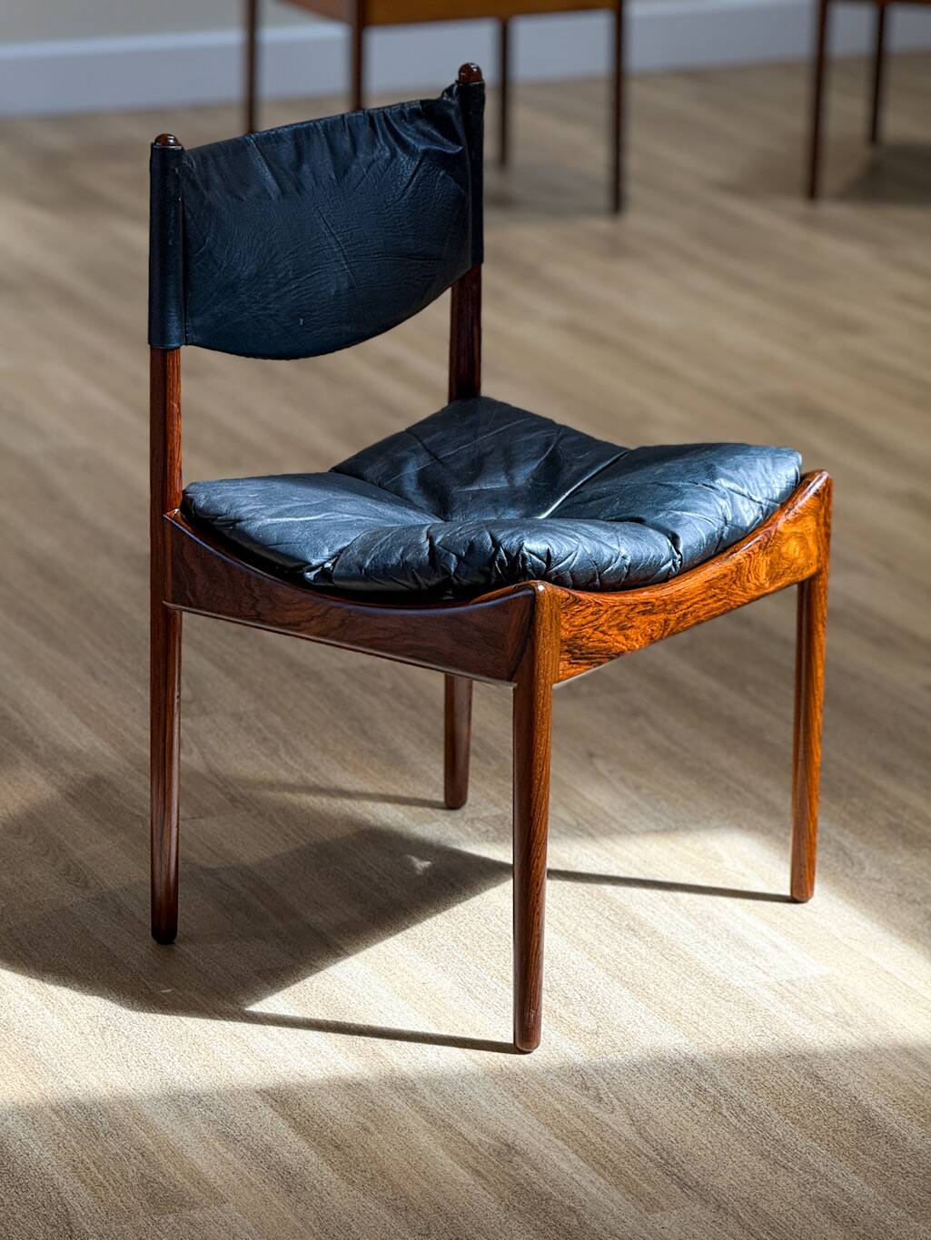 Extendable dining room table and chairs (by Kristian Solmer Vedel)