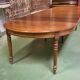 Louis Philippe round table 8 feet in cherry with 6 extensions