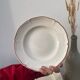 12 white old flat plates with brown fillet