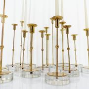 Set of 15 Scandinavian candle holders in brass and glass, Gunnar Ander, Ystad Met