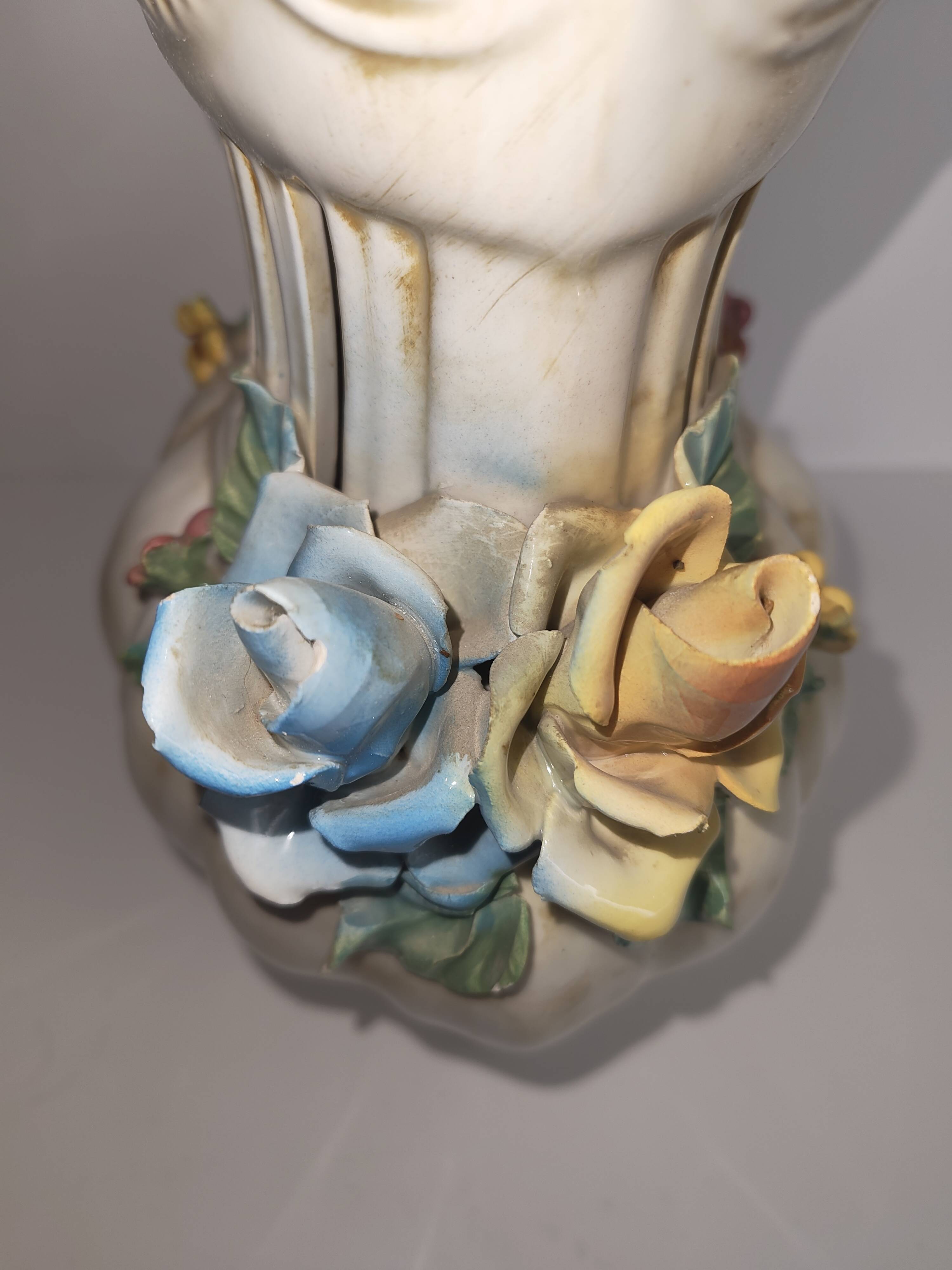 Antique ceramic pot-pourri vase with relief floral decoration.