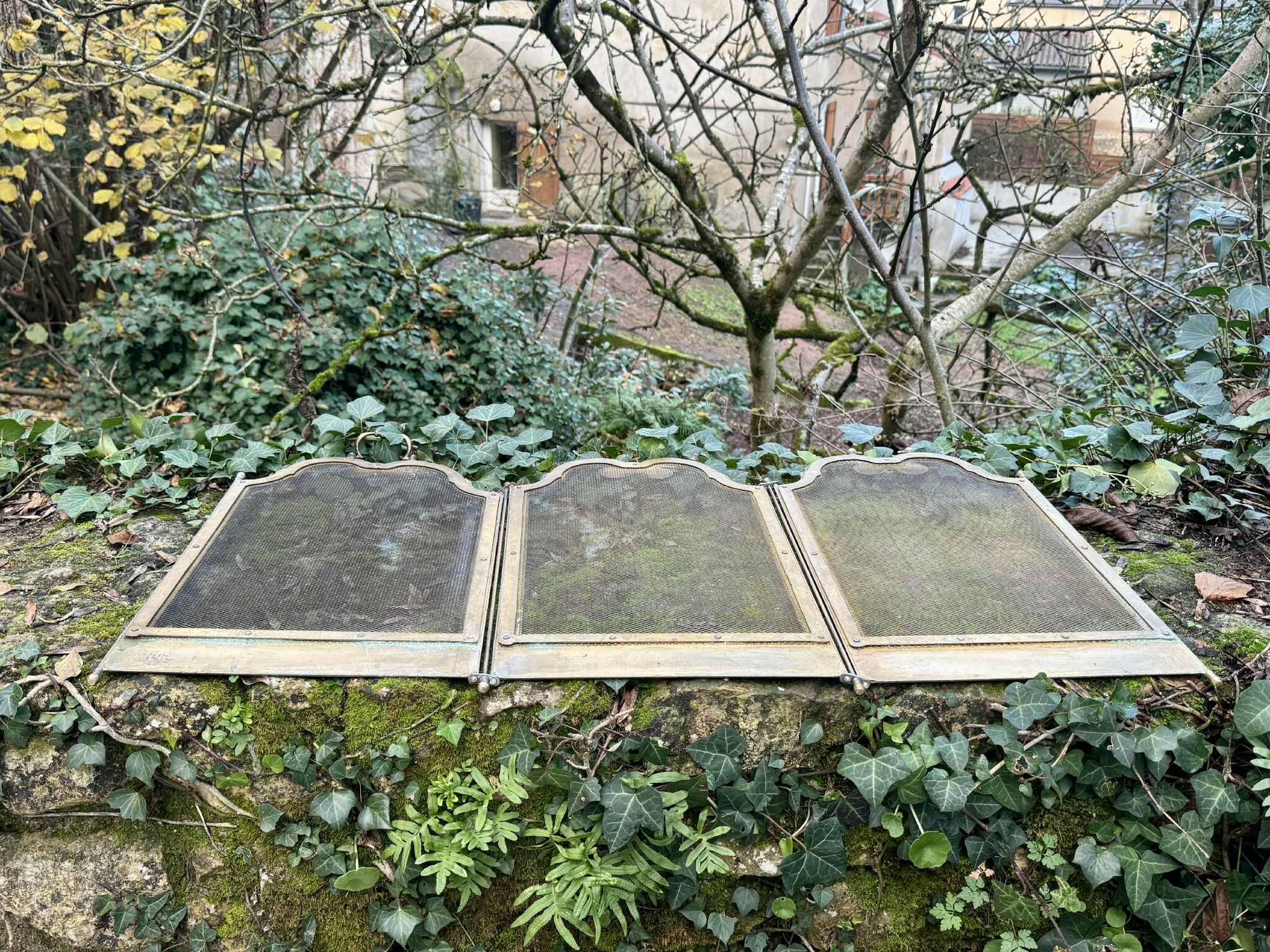 Antique brass fireplace screen