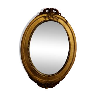 Small carved gilded wooden mirror