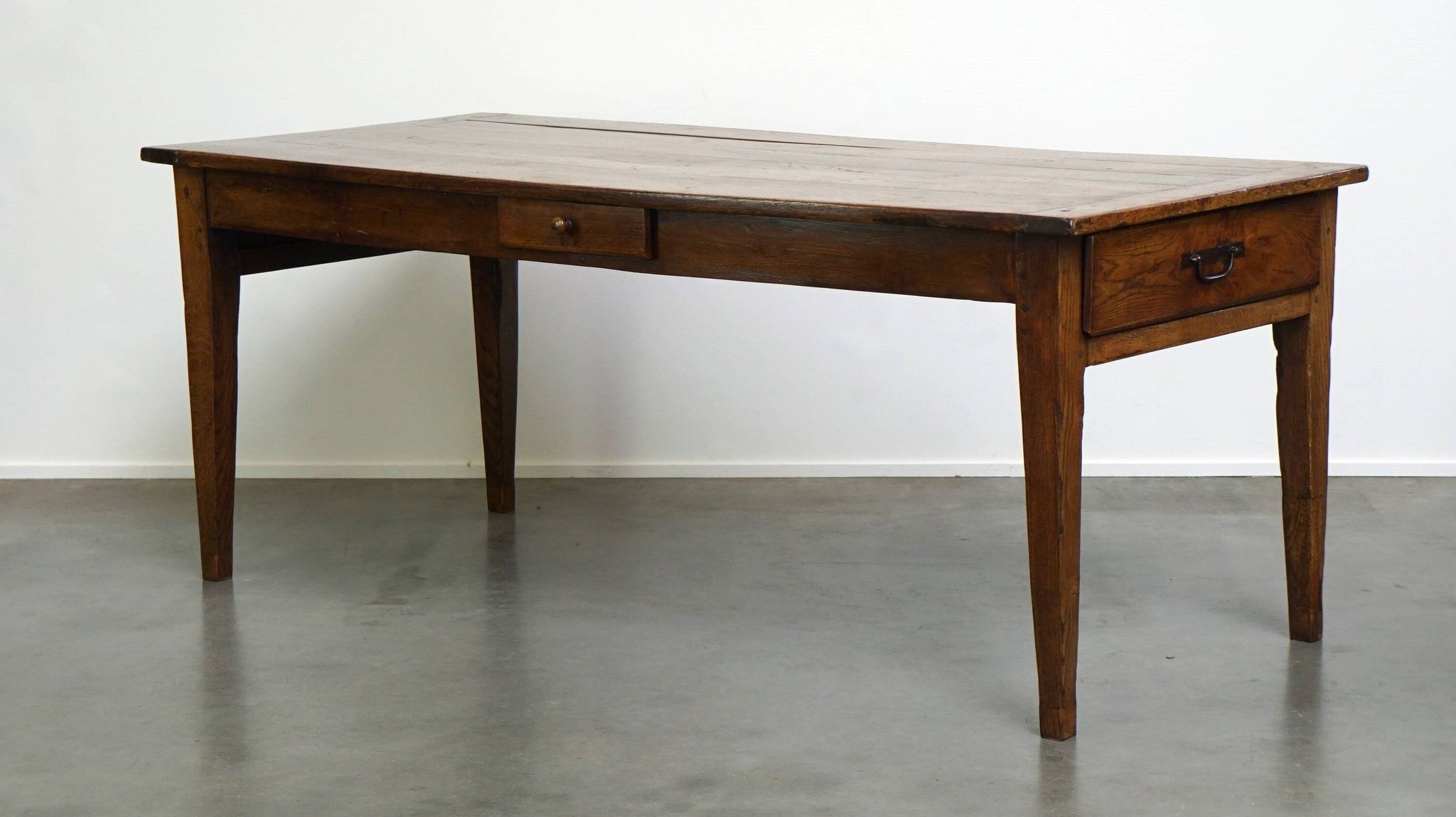 antique French oak dining table with 3 drawers and an exquisite patina