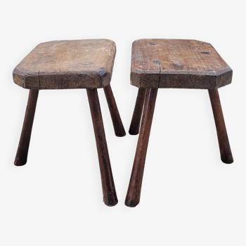 Pair of solid octagon cowhide tripod stools