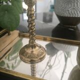 Twisted candlestick in gold metal