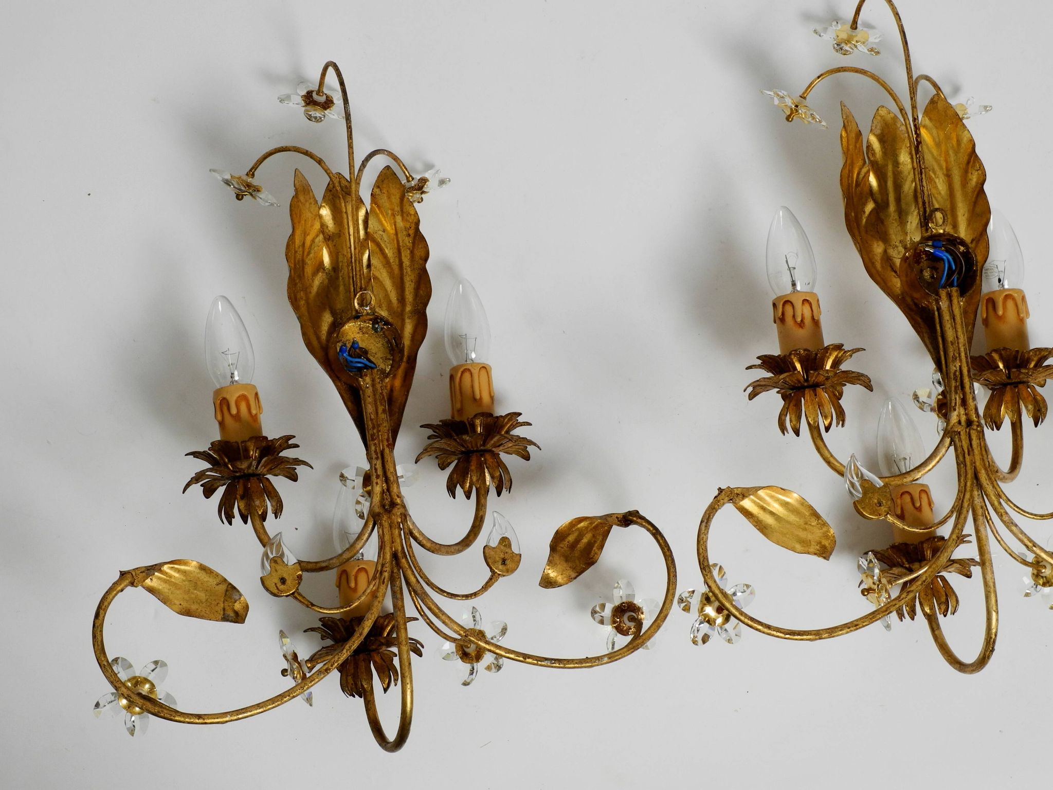 Pair of gold plated Italian 1980's floral Regency Murano glass sconces