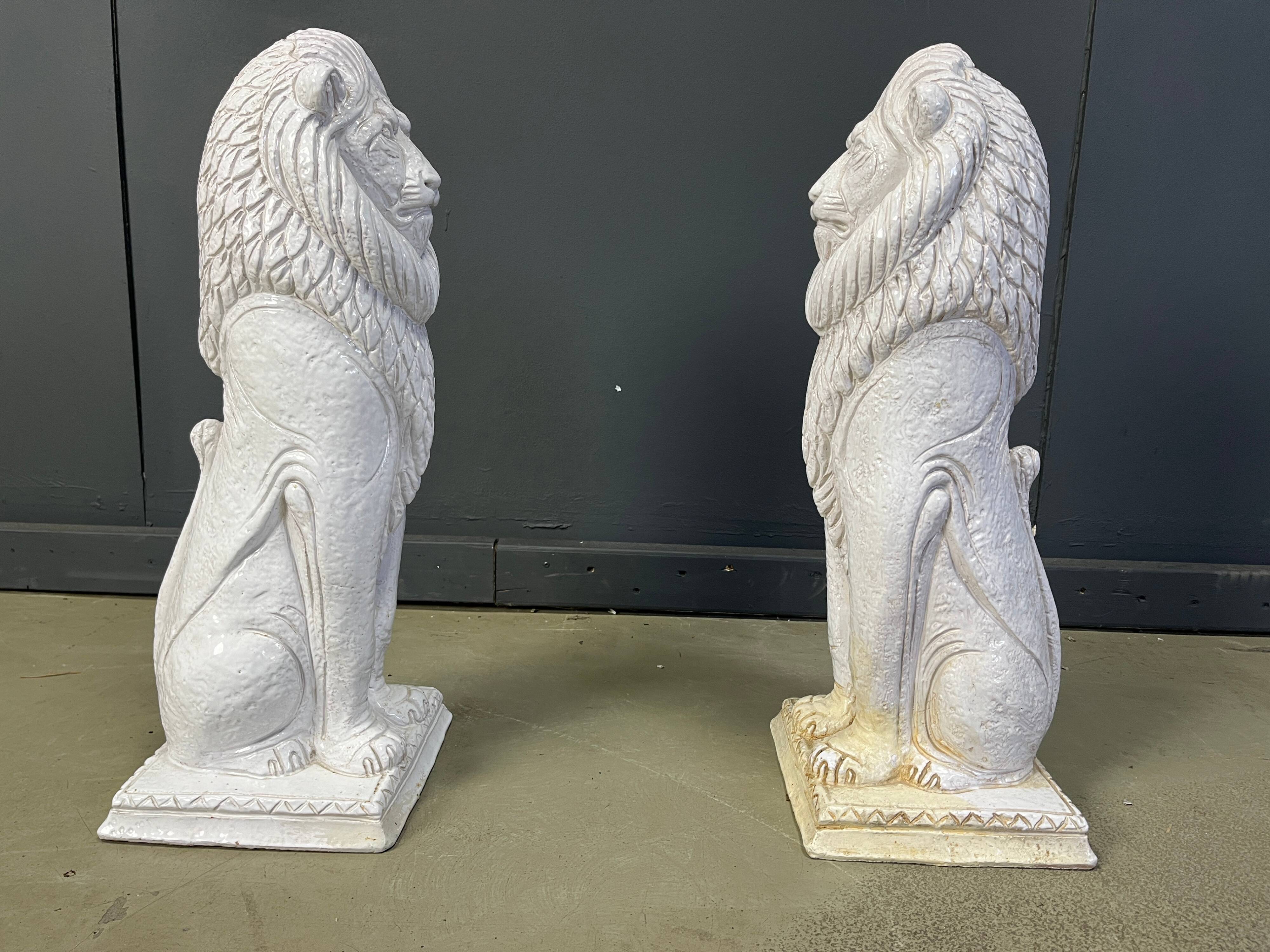 Pair of Renaissance style terracotta lion sculptures, 1950s