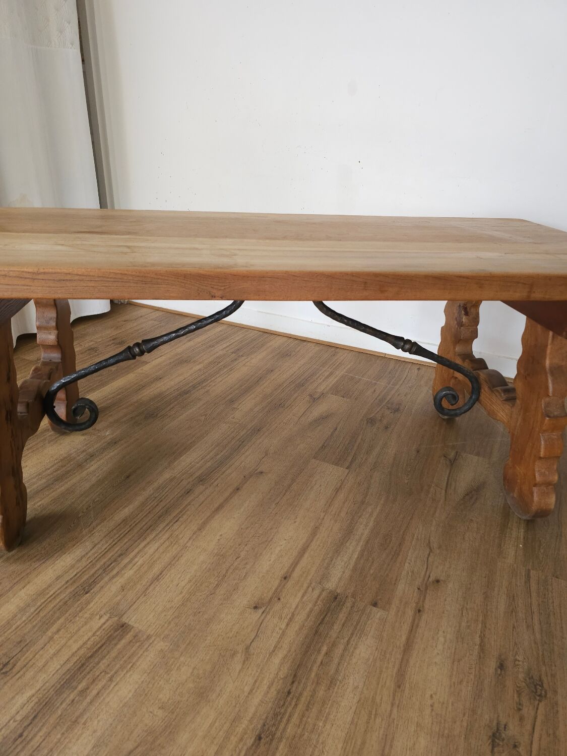 Rustic solid oak table with wrought iron, circa 1950.