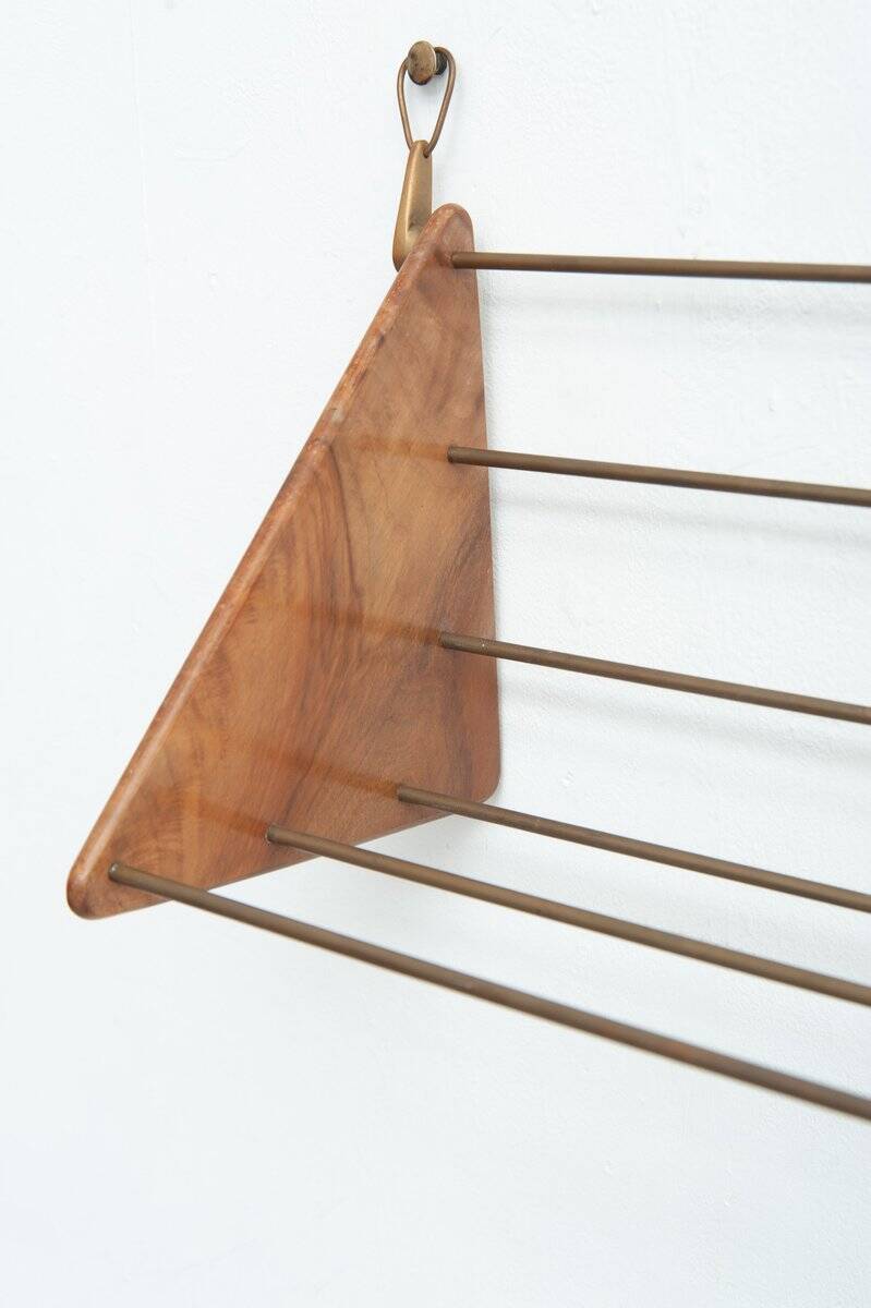Wall-mounted walnut bookshelf by Carl Auböck, 1950s