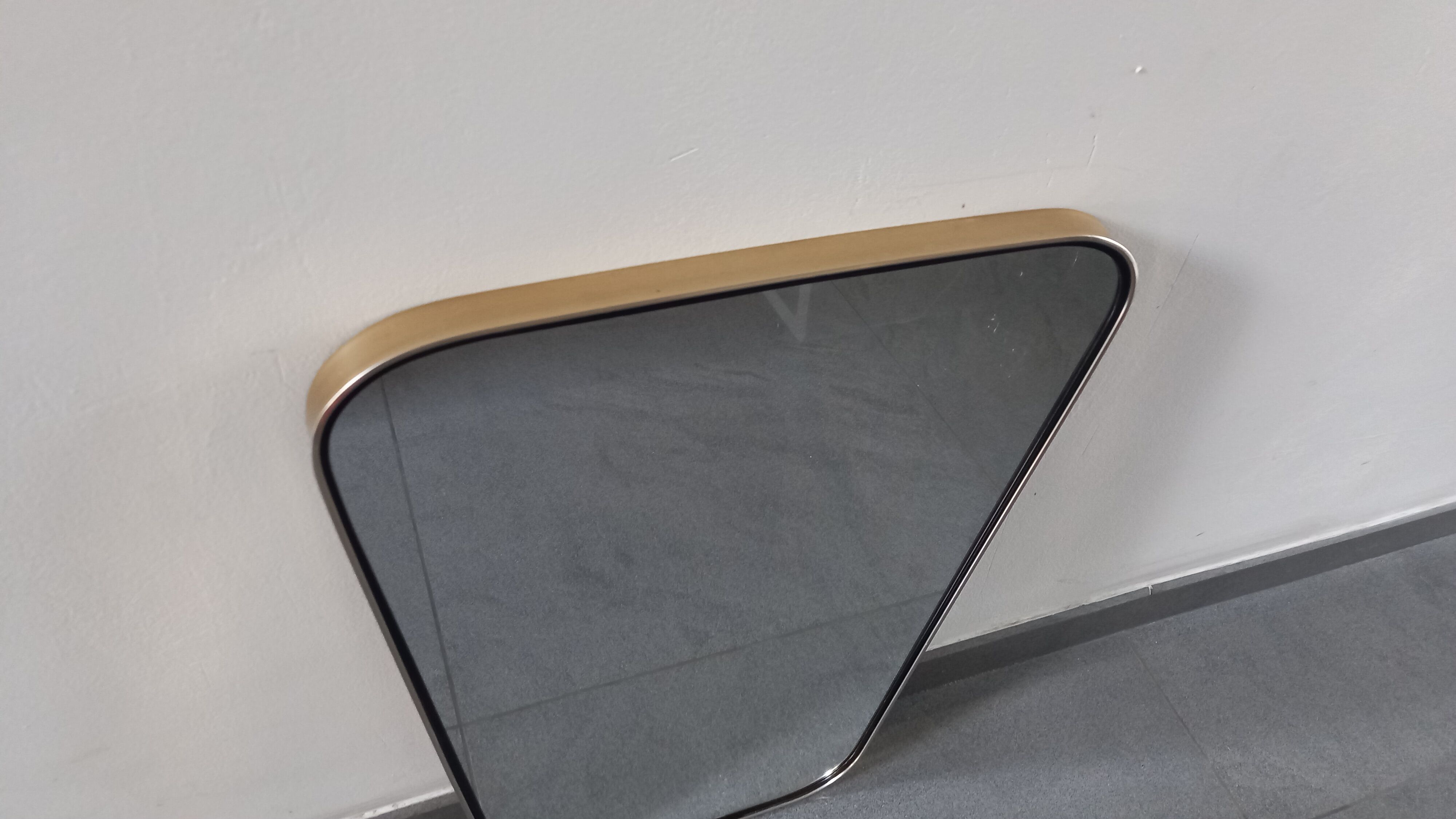 Asymmetric mirror