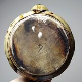 A pair of small vintage teapots in the Art Deco style reminiscent of Denbac.