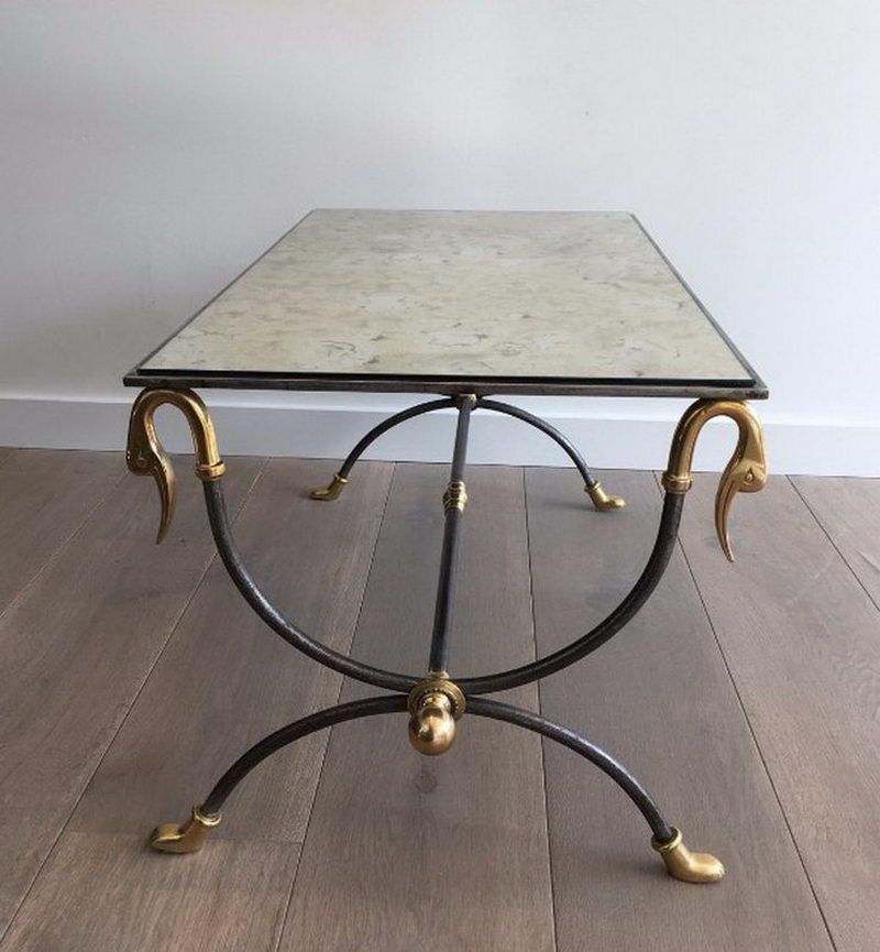Coffee table in brushed steel and brass