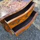 Louis XV style jump commode with marquetry and marble decoration.