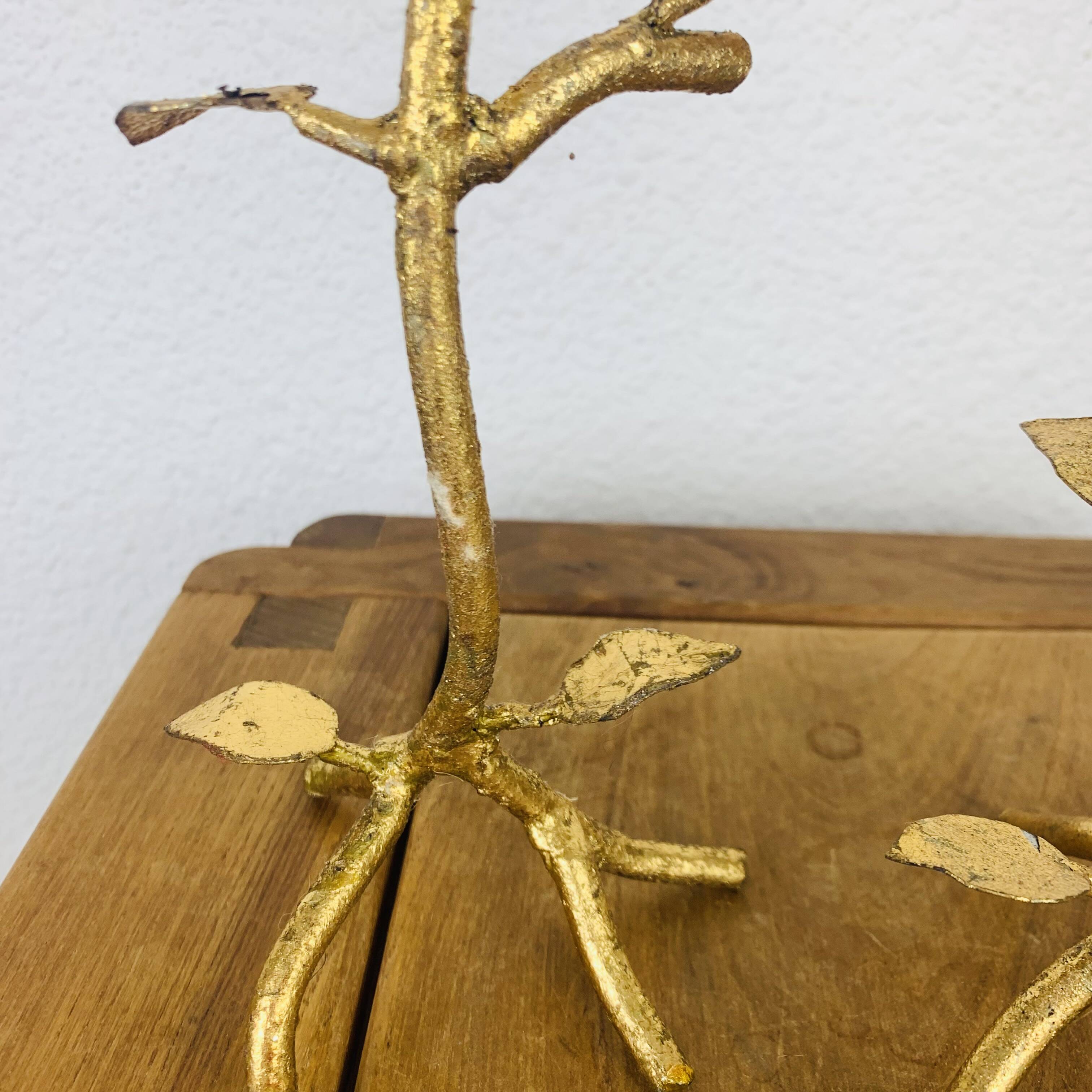 Pair of golden foliage candlesticks