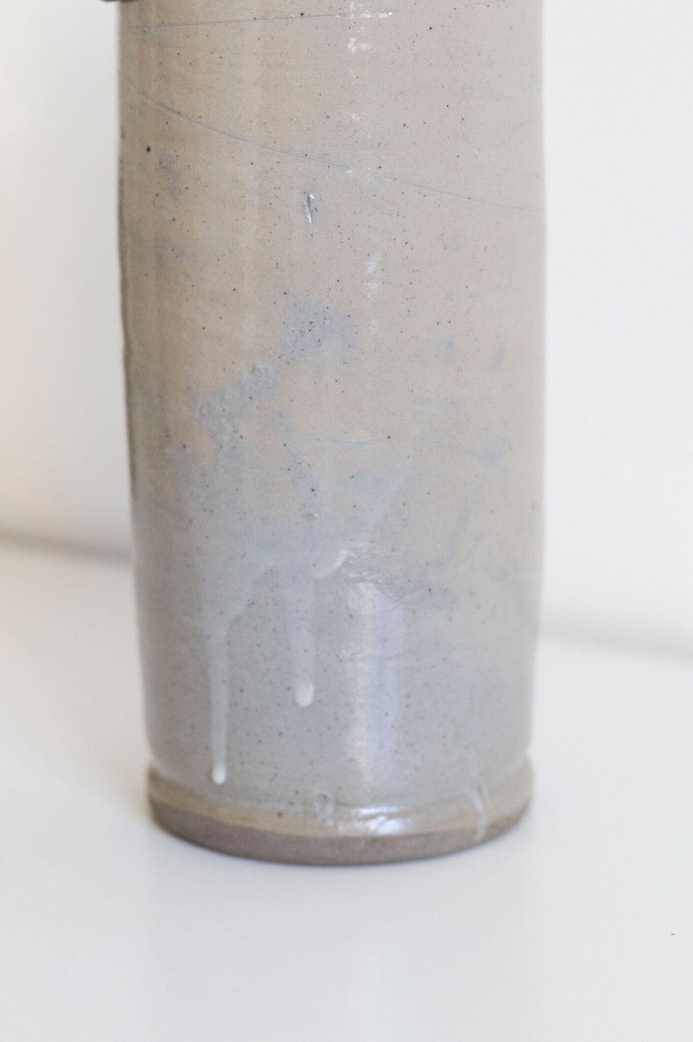 Bottle of enamelled stoneware hot water bottle