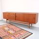 Teak ring buffet in vintage retro style from the 60s-70s.