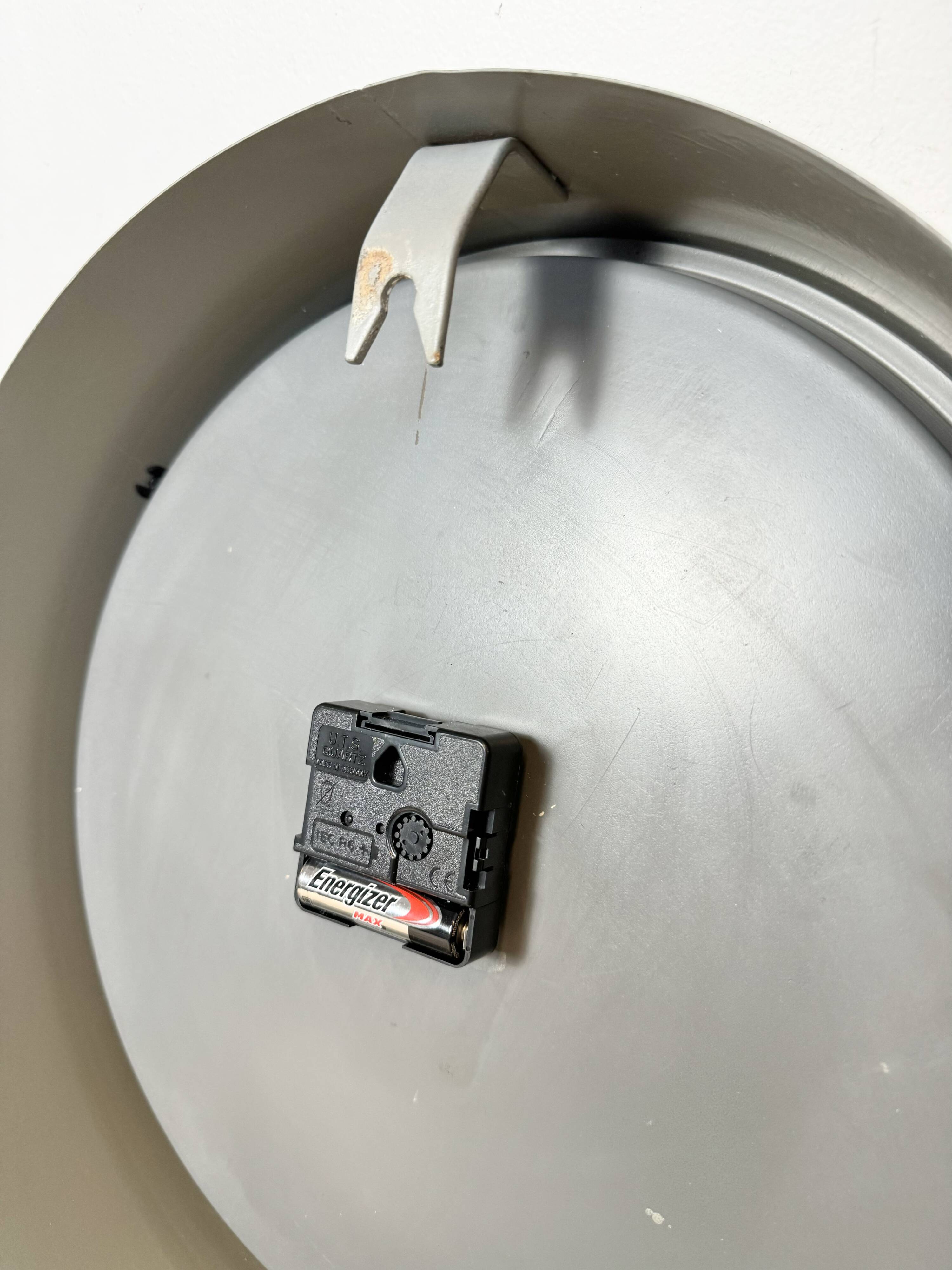Industrial grey factory wall clock from pragotron, 1960s