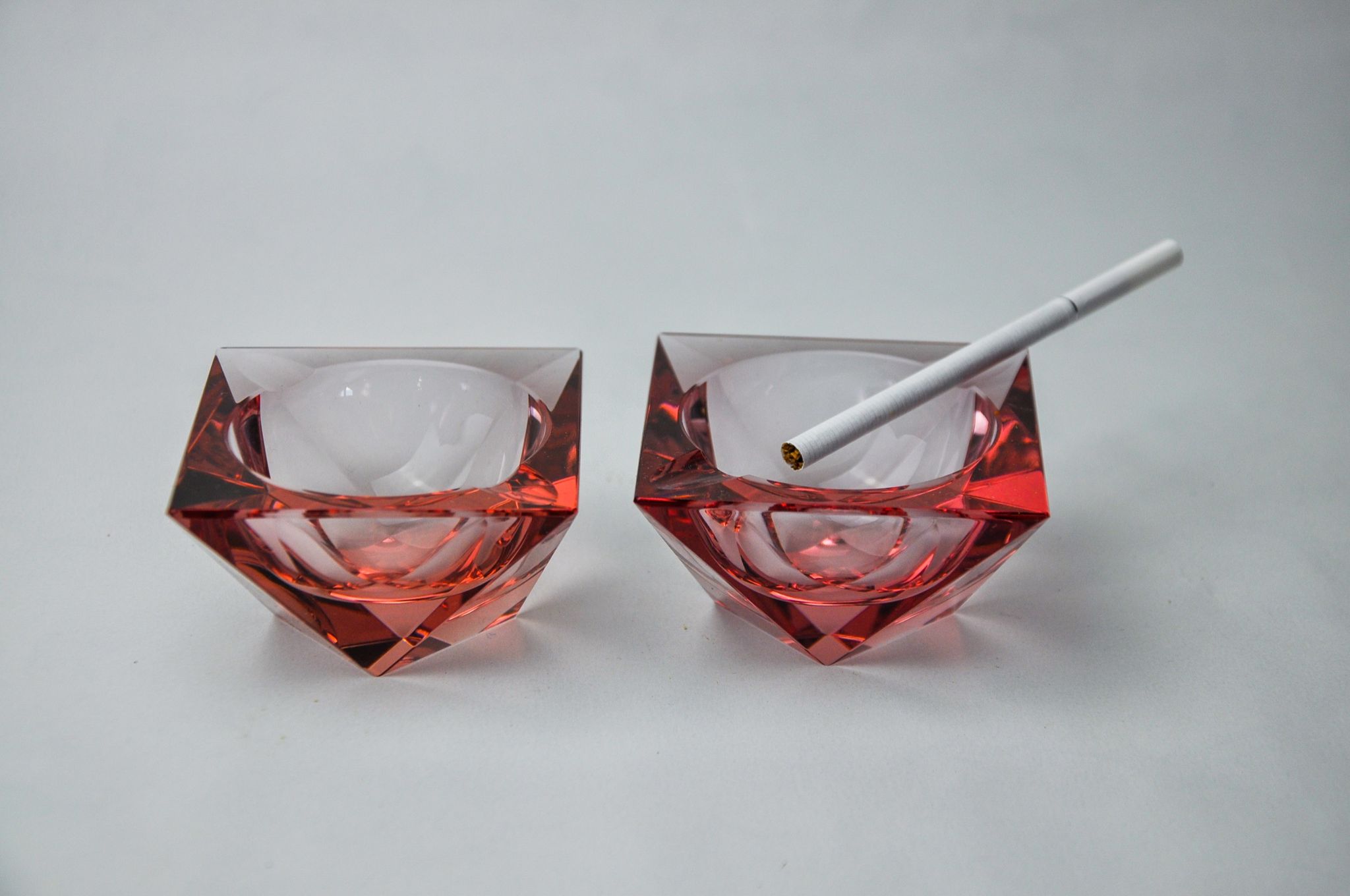 Duo of pink faceted ashtrays by Seguso, murano, italy, 1970