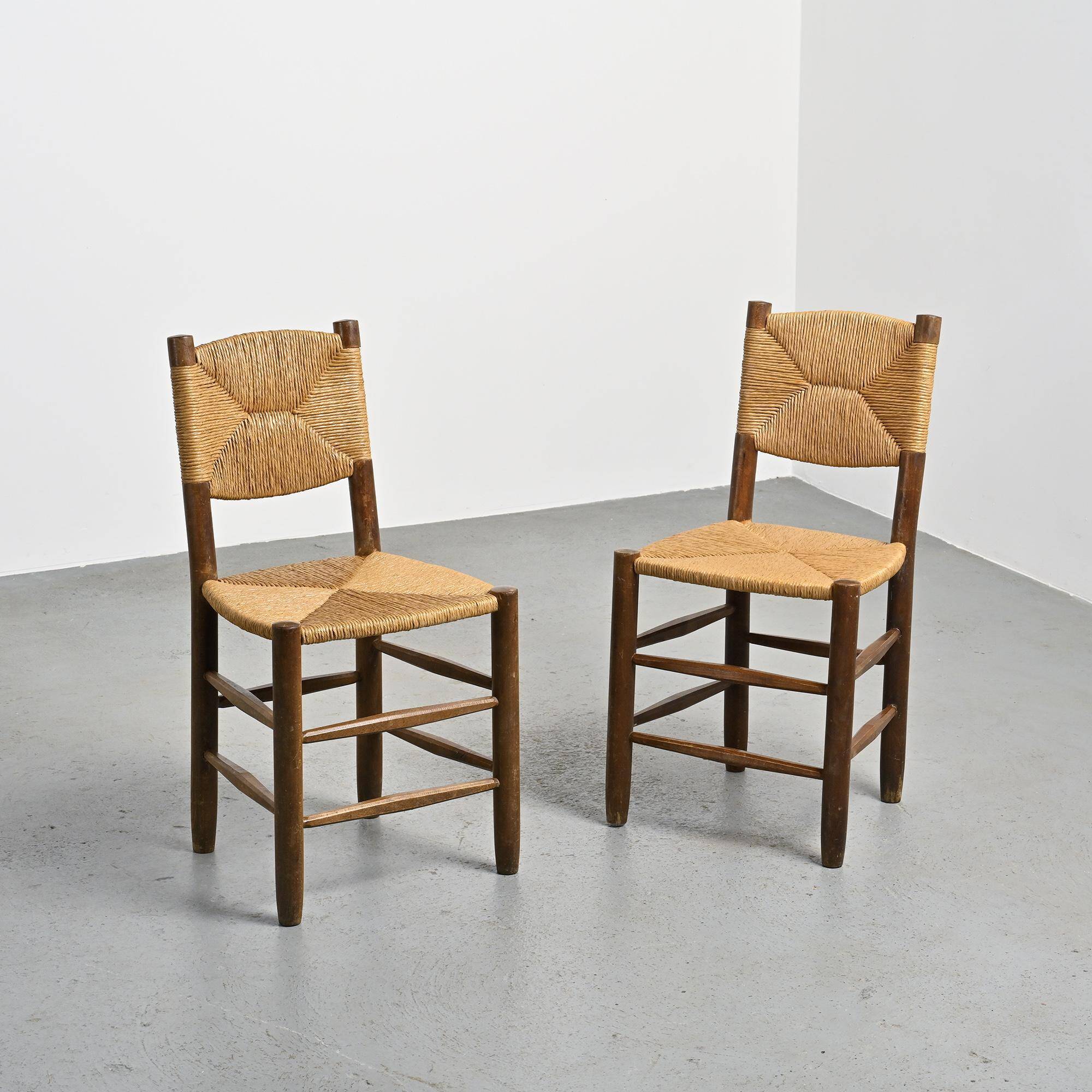 Paire de chaises modèle Bauche par Charlotte Perriand, circa 1950