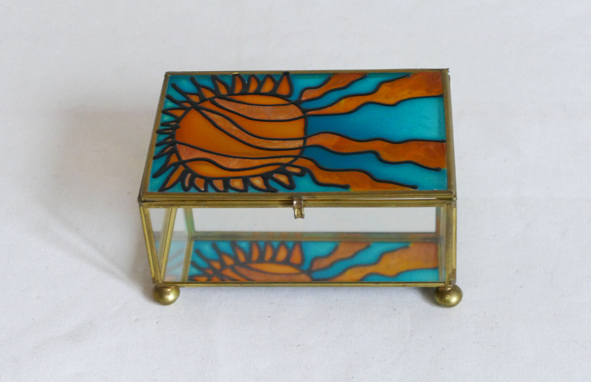Blue and orange vintage jewellery box in 70s bohemian chic stained glass