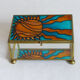 Blue and orange vintage jewellery box in 70s bohemian chic stained glass