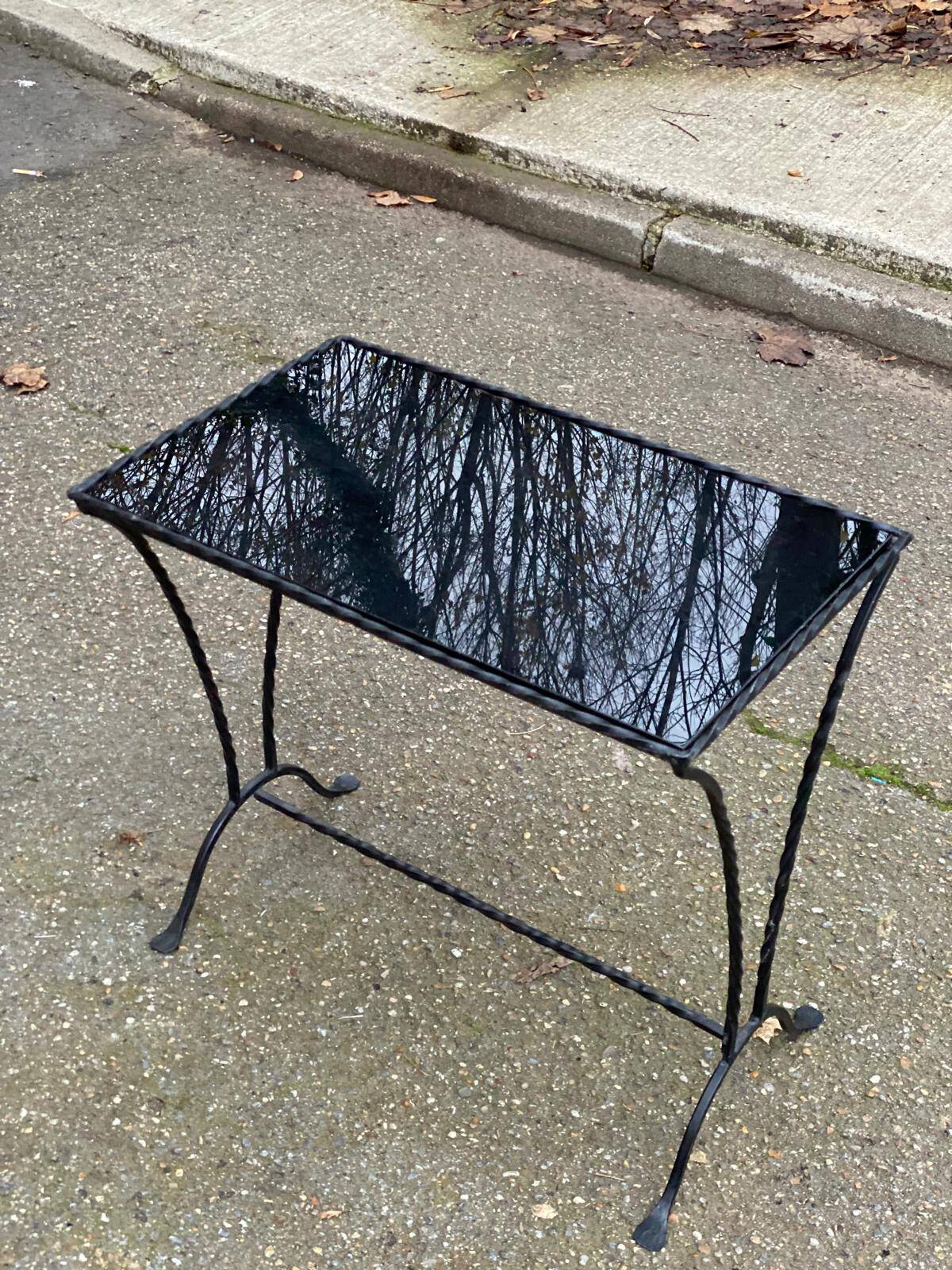 Coffee table/side table in the style of Jacques Adnet, made of steel and glass