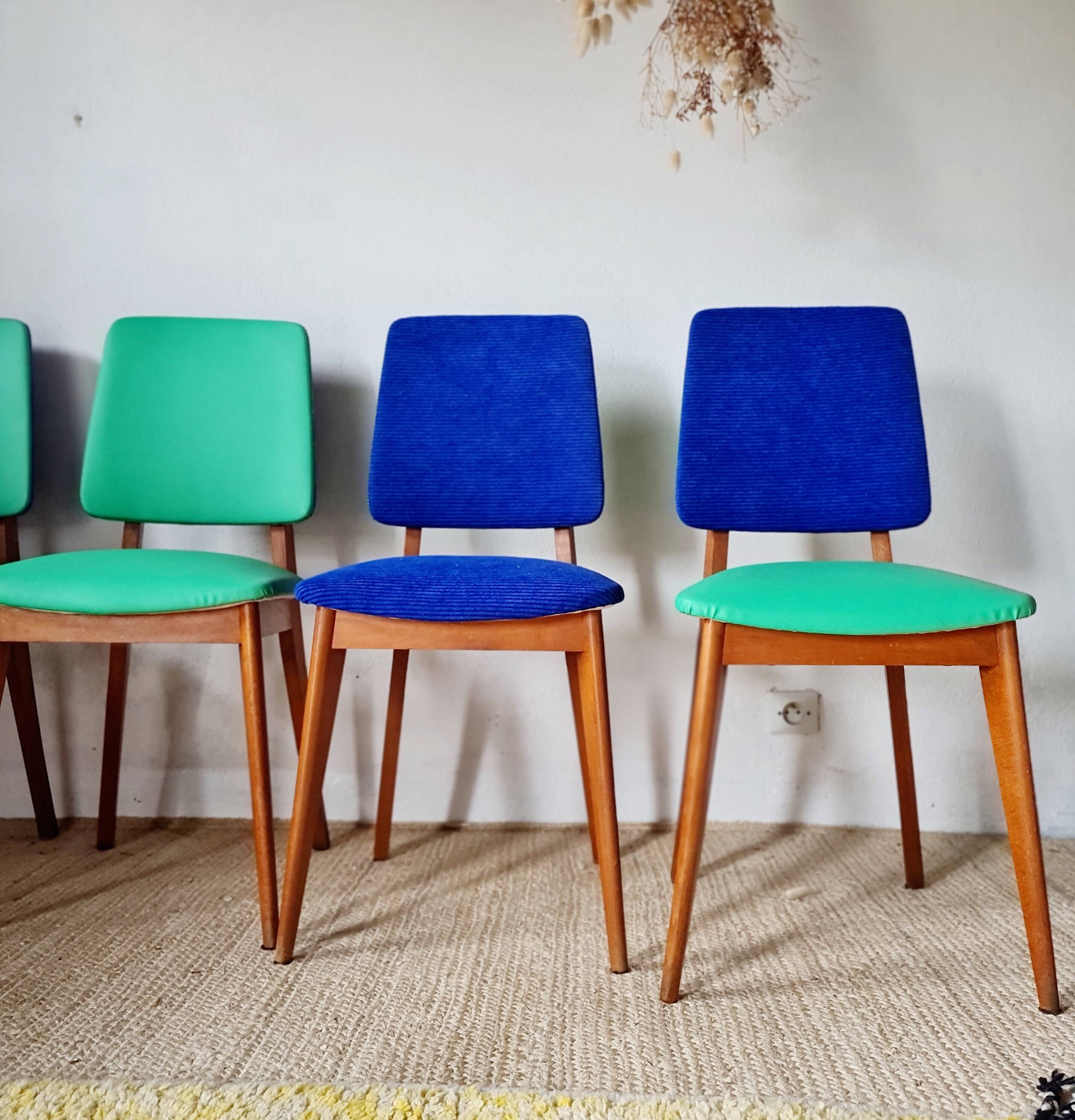 Series of velvet Scandinavian chairs - green and blue.