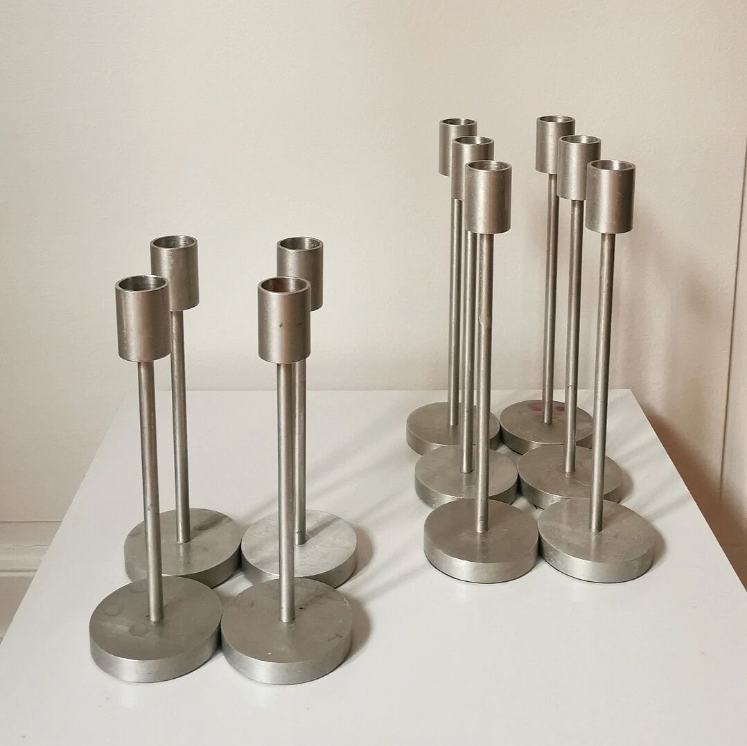 Set of 10 aluminium candle holders.