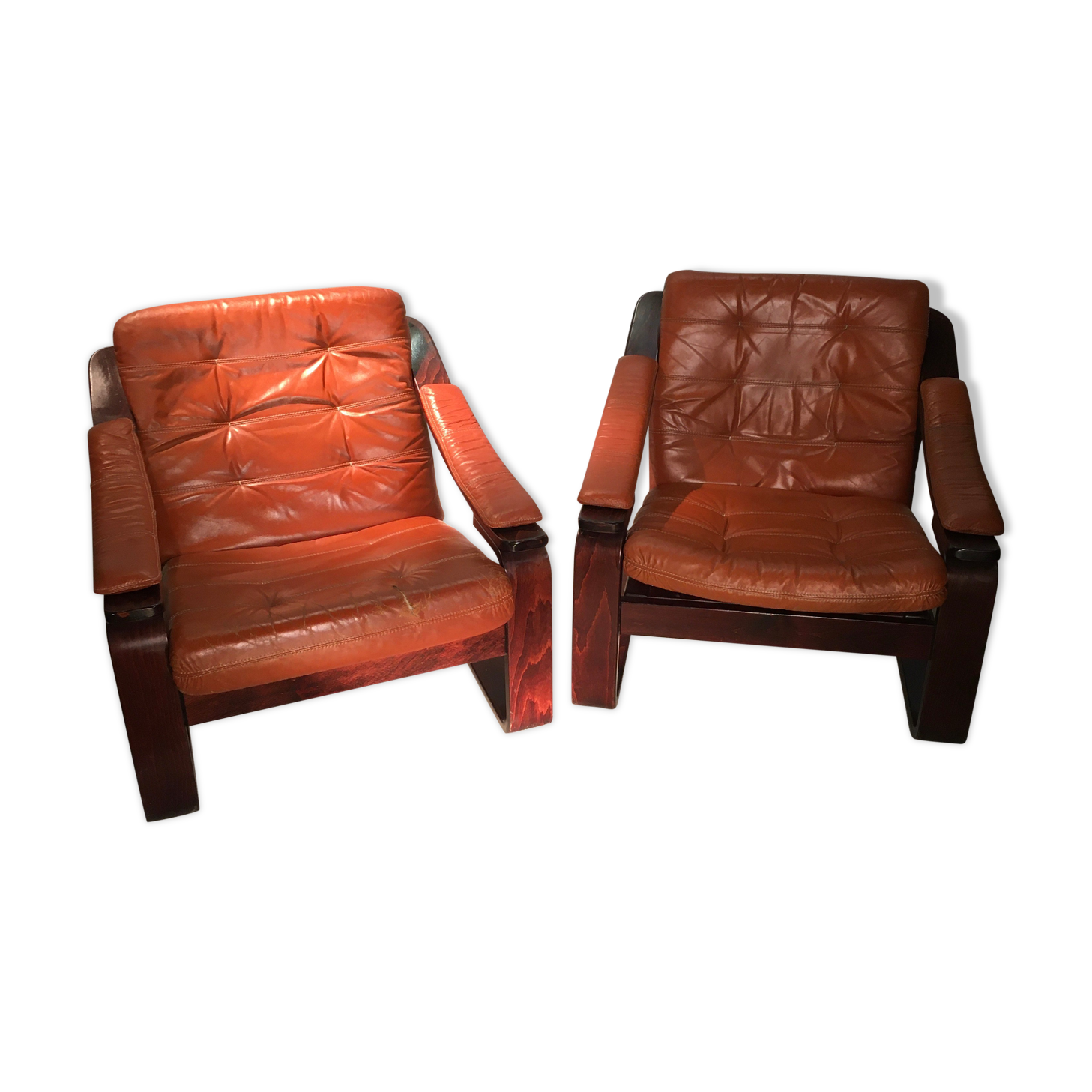 Duo of ochre leather and wood frame armchairs