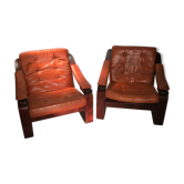 Duo of ochre leather and wood frame armchairs