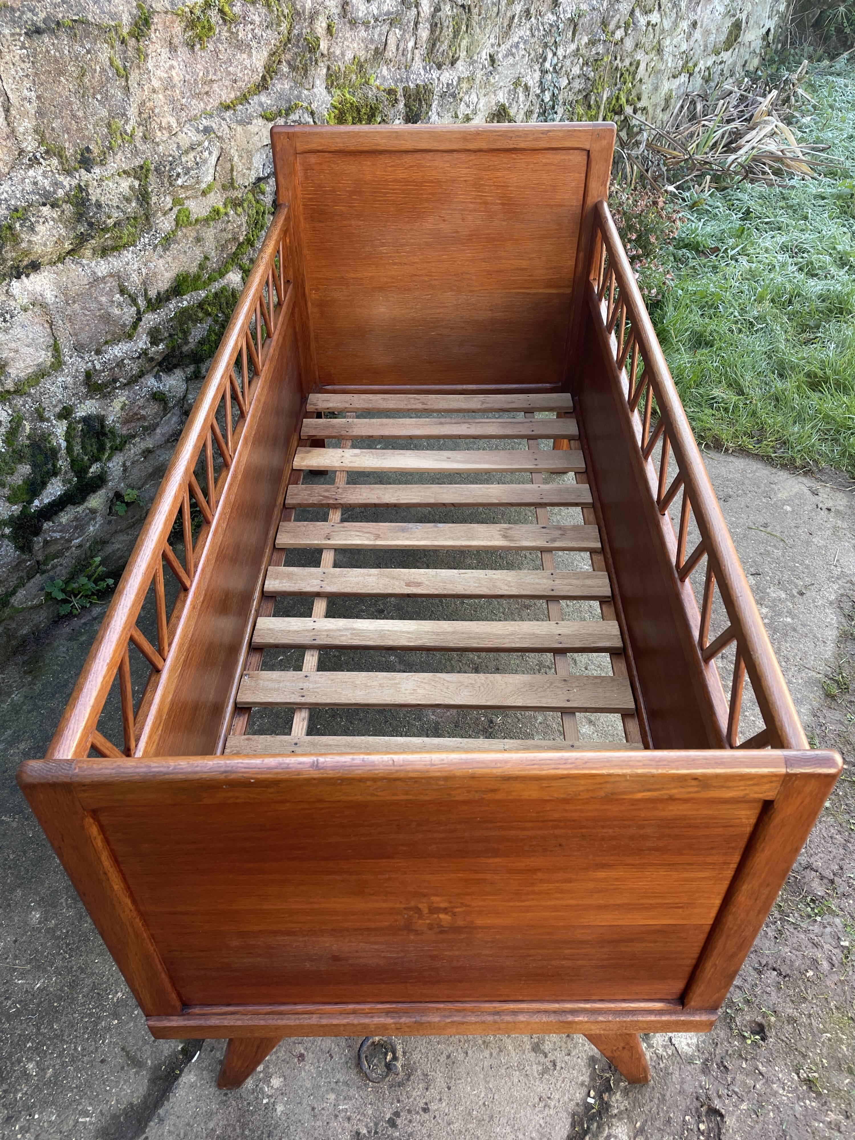 Handmade children's bed with compass feet 1950