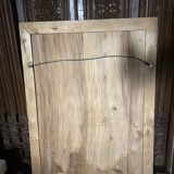 wooden painting with carved floral motif - note a restoration on the left side at the bottom.
