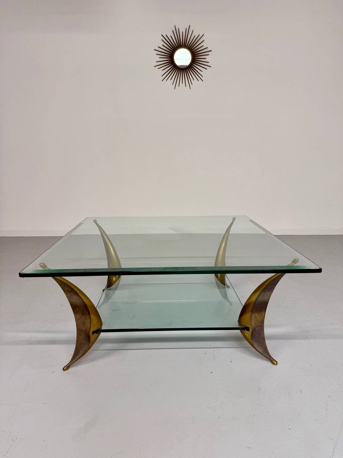Glass coffee table with solid brass legs, Italian design from the 60s