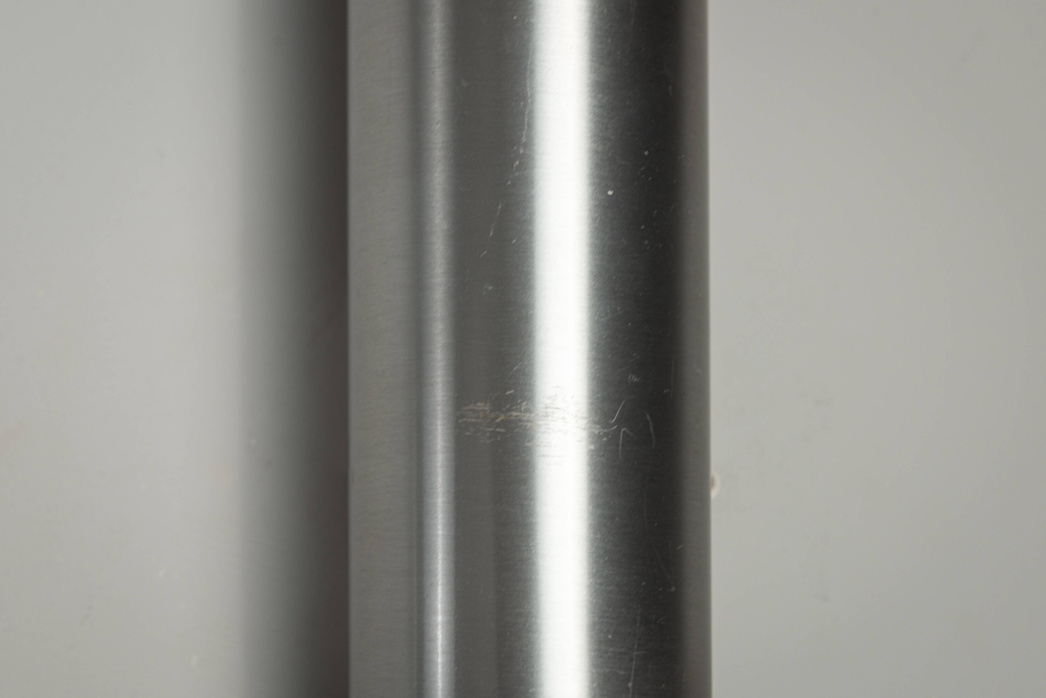 Set of three aluminium cylindrical wall lamps