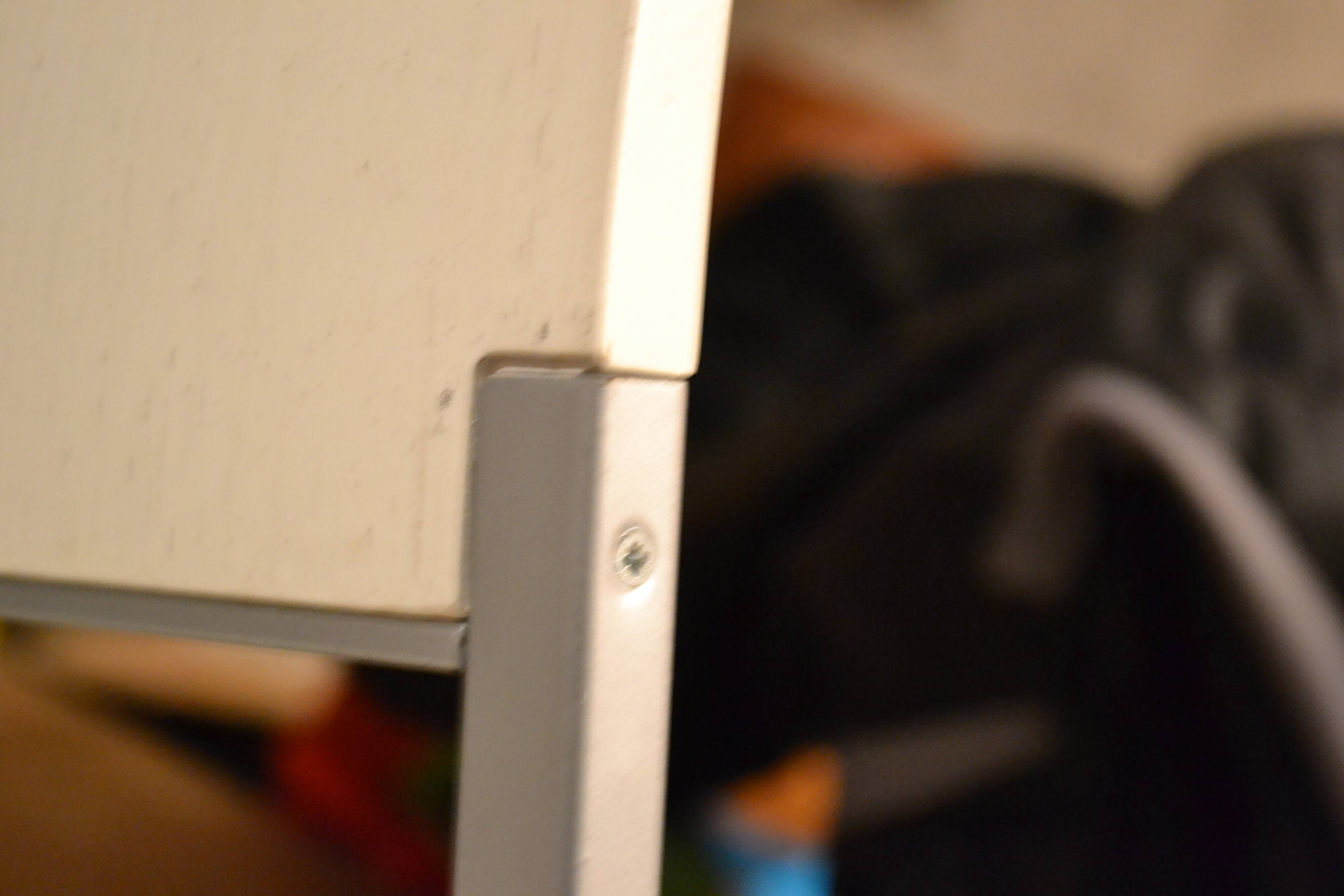 Set of 4 vintage metal and wood chairs from the 1990s.