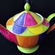 Polychrome porcelain teapot hand-painted.
