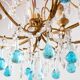 Italian chandelier in gold metal and blue crystal drops