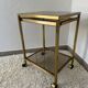 Brass rolling trolley with smoked glass from the 70s