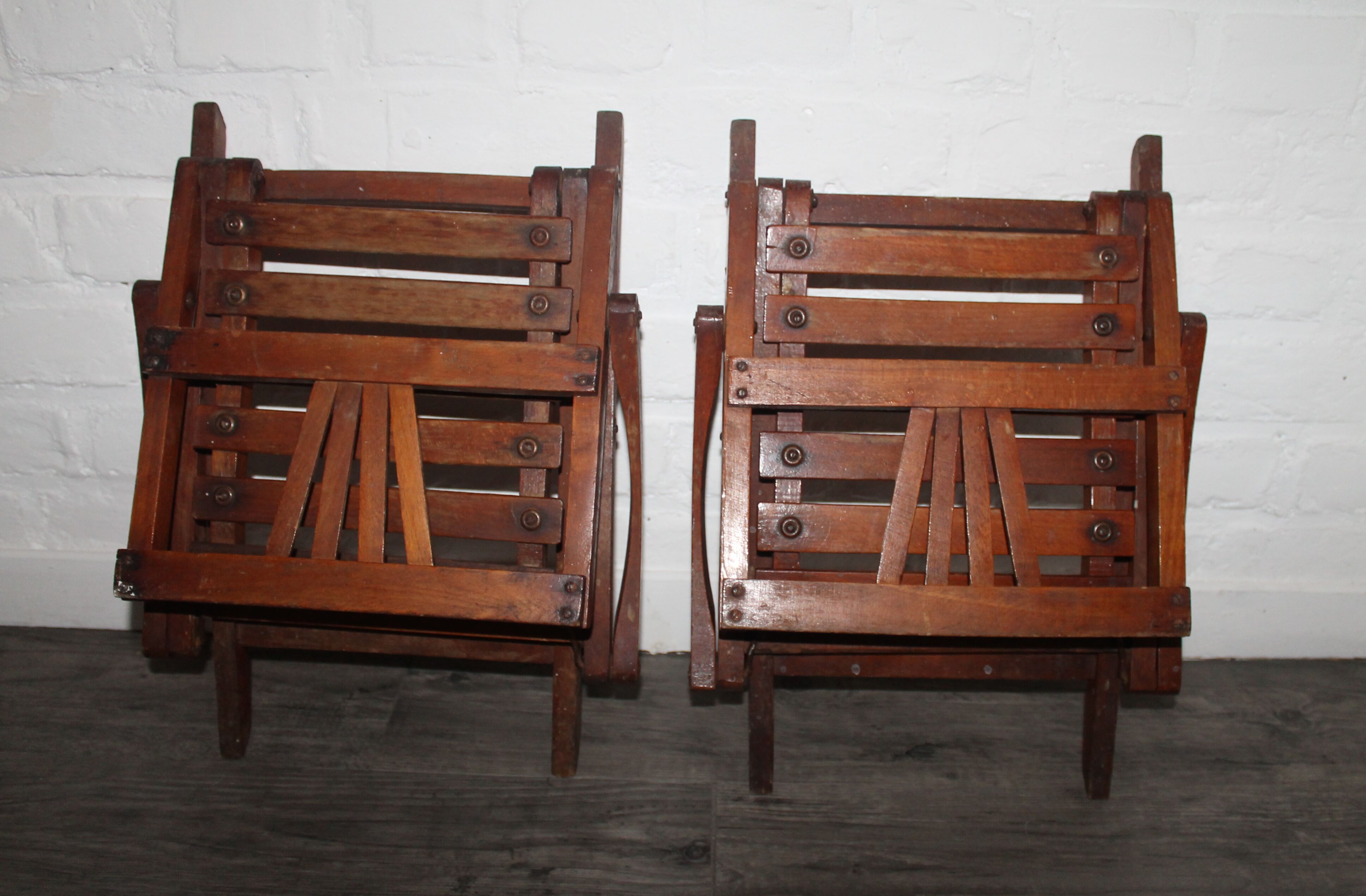 2 wooden folding chairs