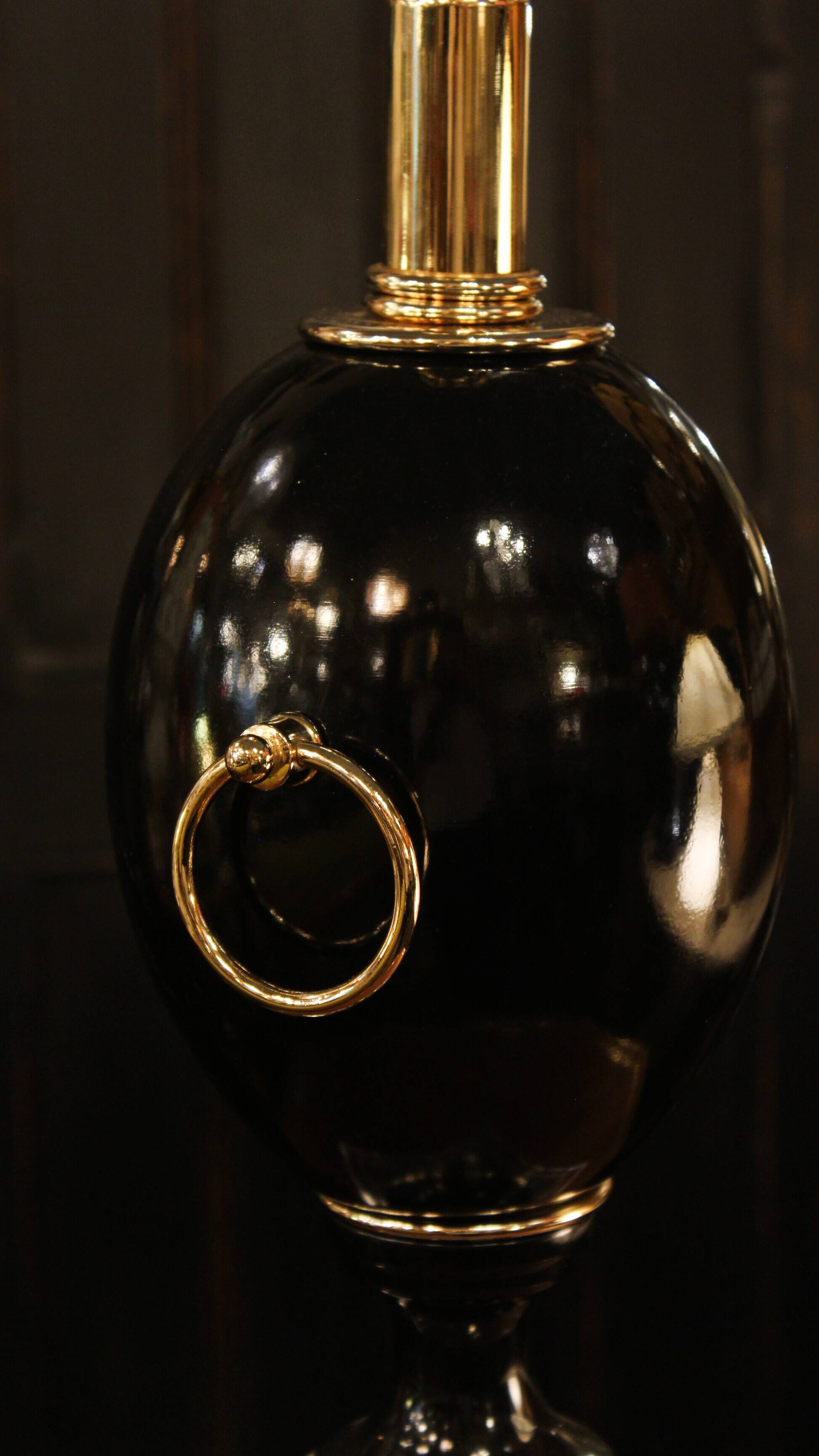 Black lamp in Hollywood Regency style