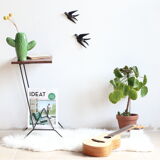 Guerin store vinyls in black metal and wood