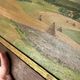 Old oil painting of a landscape on panel from 1920, haystacks.